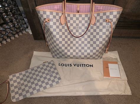 white louis vuitton bag with pink inside